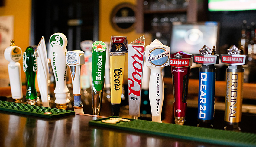 Various beer brand taps on display at The Squire Pub & Grill located in London, Ontario